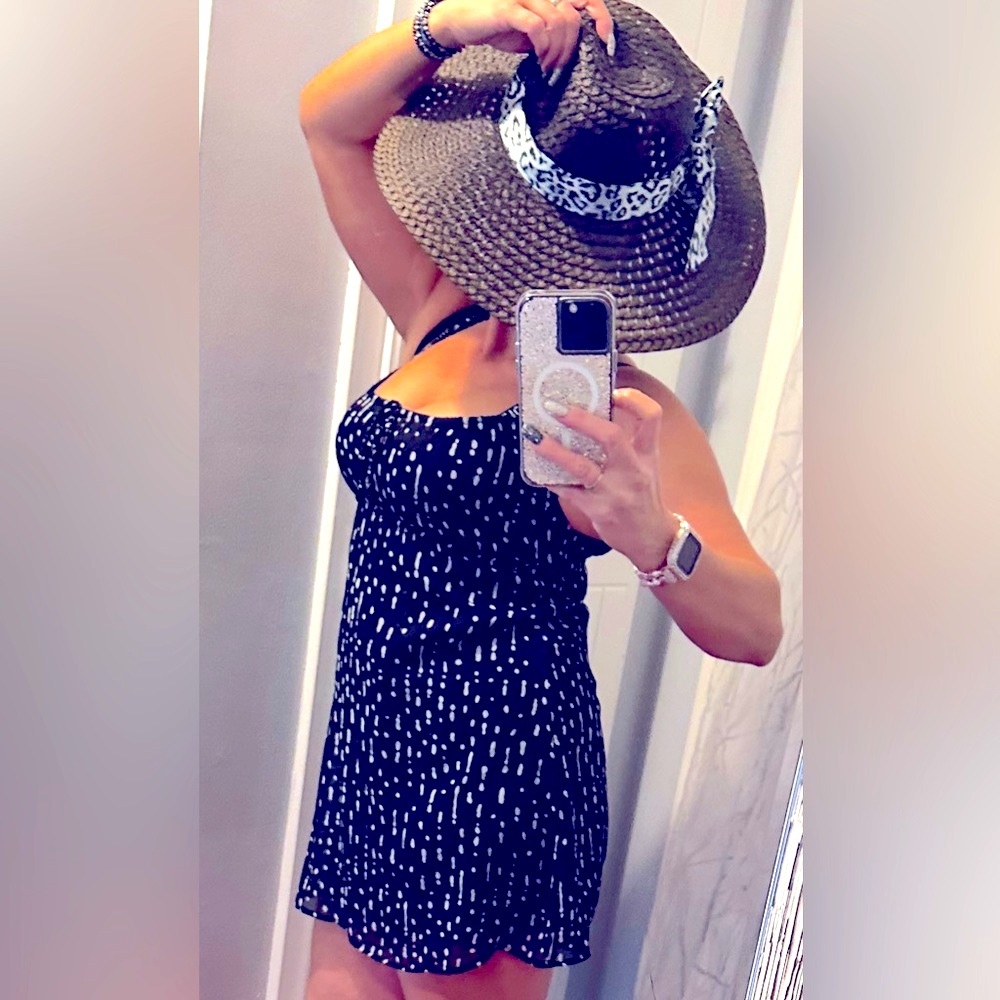 ROXY JR’s XS SWEET and STYLISH mini sundress from Roxy. Black with white print.